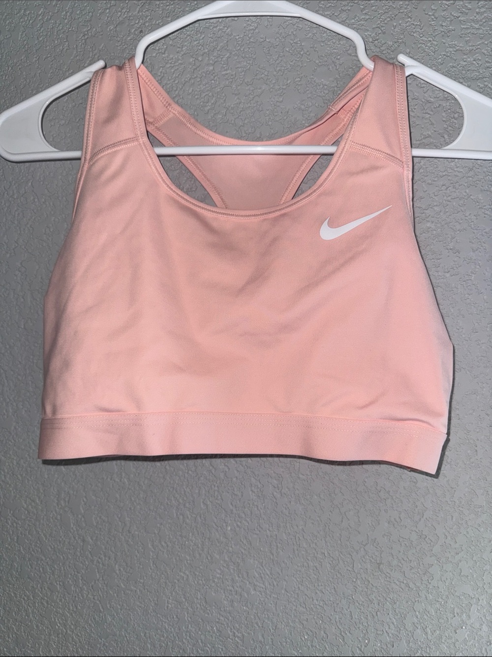 Nike Light Pink Racerback Sports Bra with White Swoosh